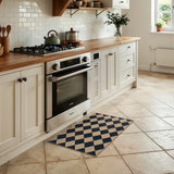 Covaba geometric checkered easy jute indoor/outdoor doormat in ink black, styled in a room setting, view 3