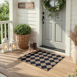 Covaba geometric checkered easy jute indoor/outdoor doormat in coffee brown, styled in a room setting, view 3