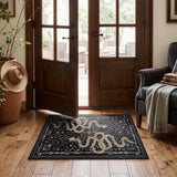 Covaba mystical snake doormat in ink black, styled in a room setting
