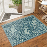 Covaba vintage woodcut forest and rabbit doormat in stormy blue, styled in a room setting