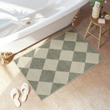 Covaba modern geometric checkered doormat in fern green, styled in a room setting, view 4