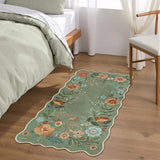 Covaba boho modern parisian floral scalloped doormat in fern green, styled in a room setting, view 4