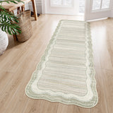 Covaba modern abstract bordered scalloped runner rug in warm beige, styled in a room setting