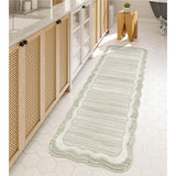 Covaba modern abstract bordered scalloped runner rug in warm beige, shown flat on a plain ivory backdrop, view 2