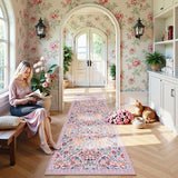 Covaba maximalism vibrant blossom floral runner rug in blush clay, styled in a room setting, view 3