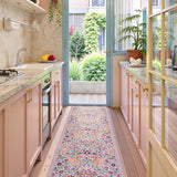 Covaba maximalism vibrant blossom floral runner rug in blush clay, styled in a room setting, view 2
