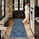 Covaba maximalism vibrant floral runner rug in stormy blue, styled in a room setting
