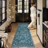 Covaba maximalism vibrant floral runner rug in teal haze, styled in a room setting, view 2