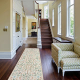 Covaba boho insect botanical floral runner rug in warm beige, styled in a room setting, view 3