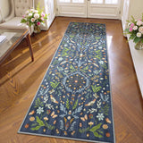 Covaba boho insect botanical floral runner rug in stormy blue, styled in a room setting