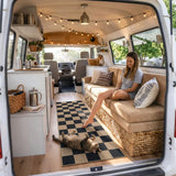 Covaba checkered easy jute natural indoor/outdoor runner rug in ink black, styled in a room setting, view 3