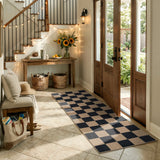 Covaba checkered easy jute natural indoor/outdoor runner rug in ink black, styled in a room setting, view 4