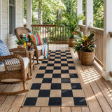 Covaba checkered easy jute natural indoor/outdoor runner rug in ink black, styled in a room setting, view 2