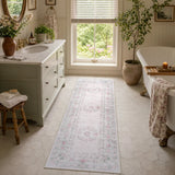 Covaba vintage traditional floral runner rug in blush clay, styled in a room setting, view 4