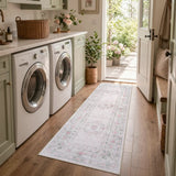 Covaba vintage traditional floral runner rug in blush clay, styled in a room setting