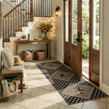 Covaba tribal soft easy jute indoor/outdoor runner rug in ink black, styled in a room setting, view 4