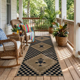 Covaba tribal soft easy jute indoor/outdoor runner rug in ink black, styled in a room setting, view 2