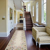Covaba modern blooming floral garden runner rug in warm beige, styled in a room setting