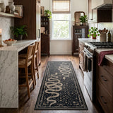 Covaba mystical snake runner rug in ink black, styled in a room setting