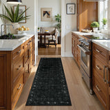 Covaba vintage persian distressed runner rug in ink black, styled in a room setting, view 11