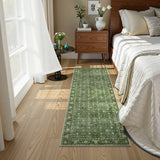Covaba vintage persian distressed runner rug in fern green, styled in a room setting, view 3