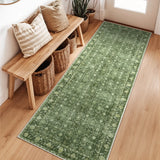Covaba vintage persian distressed runner rug in fern green, styled in a room setting