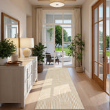 Covaba abstract rainbow stripe orange/white runner rug in amber clay, styled in a room setting, view 2