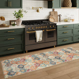 Covaba ultra-thin vintage floral moroccan trellis and runner rug in faded rose, styled in a room setting