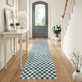 Covaba check soft easy jute black/white indoor/outdoor runner rug in soft white, styled in a room setting, view 2