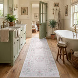 Covaba vintage traditional floral runner rug in blush clay, styled in a room setting, view 5