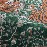 Covaba wild tiger rug in fern green, styled in a room setting