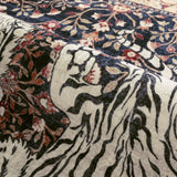 Covaba wild tiger rug in coffee brown, styled in a room setting