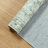 Covaba vintage rug in fern green, styled in a room setting, view 2