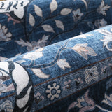Covaba wild tiger rug in stormy blue, styled in a room setting