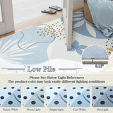 Covaba modern botanical leaf rug in stormy blue, styled in a room setting, view 4