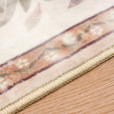 Covaba vintage floral rug in blush clay, styled in a room setting