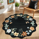 Covaba boho modern parisian floral scalloped round rug in ink black, styled in a room setting