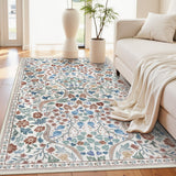 Covaba maximalism vibrant blossom floral area rug in warm beige, styled in a room setting, view 5