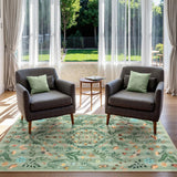 Covaba boho insect botanical floral area rug in fern green, styled in a room setting, view 7