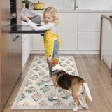 Covaba meadow floral area rug in warm beige, styled in a room setting, view 9
