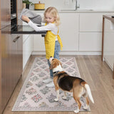 Covaba meadow floral area rug in blush clay, styled in a room setting, view 12