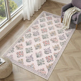 Covaba meadow floral area rug in blush clay, styled in a room setting, view 10