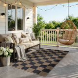 Covaba checkered easy jute indoor/outdoor area rug in coffee brown, styled in a room setting, view 5