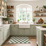 Covaba modern checkerboard area rug in olive grove, styled in a room setting, view 13