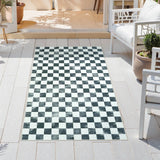 Covaba check soft easy jute black/white indoor/outdoor runner rug in soft white, styled in a room setting, view 7