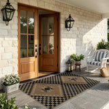 Covaba tribal soft easy jute indoor/outdoor area rug in ink black, styled in a room setting, view 3