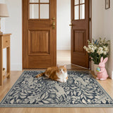 Covaba vintage woodcut forest and rabbit area rug in pearl grey, styled in a room setting, view 9