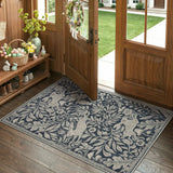 Covaba vintage woodcut forest and rabbit area rug in pearl grey, styled in a room setting, view 11