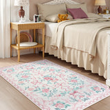 Covaba floral bows area rug in blush clay, styled in a room setting, view 6