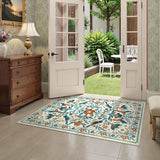 Covaba boho birdsong floral garden area rug in warm beige, styled in a room setting, view 9
